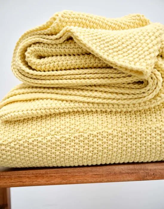 Pale yellow cushions top